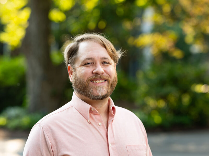 Portrait of Broadcast Engineer Colin Vereen in the courtyard at the Georgia Center for Continuing Education and Hotel.